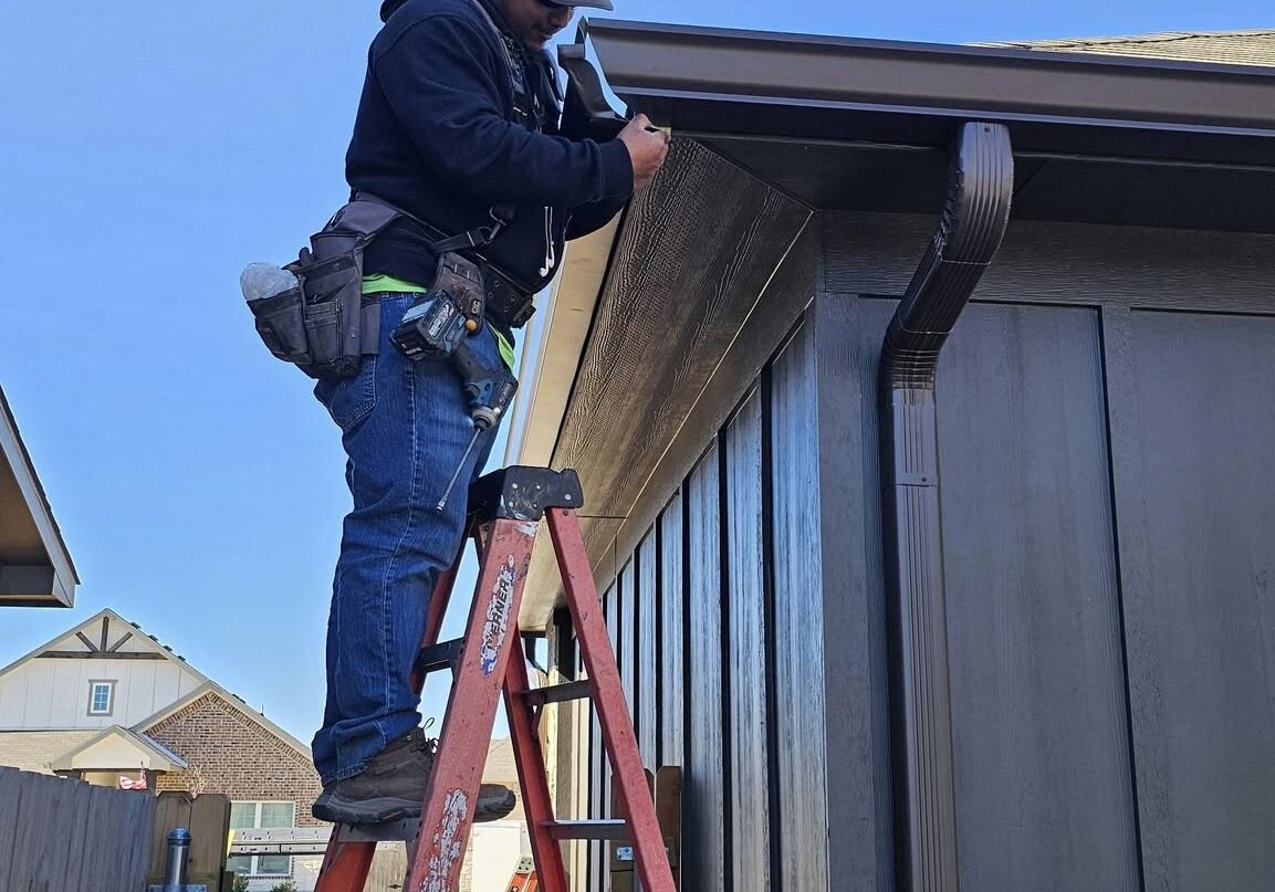 Professional seamless gutter installation repairs by AquaWorks Rain Gutters crew